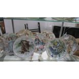Five Royal Worcester Christmas plates and two WWF Bradex bird plates.