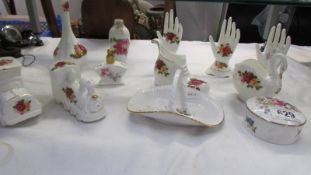 A mixed lot of rose decorated ornaments including Spode and Royal Worcester.