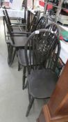 A set of six wheel back kitchen chairs,