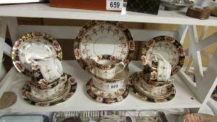 16 pieces of vintage tea ware including teapot stand.