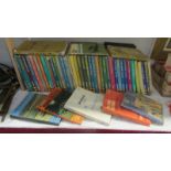 A large quantity of various car manuals.