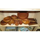 A shelf of wooden bowls etc.