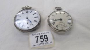 Two silver pocket watches.