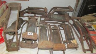 Nine old foot pumps.