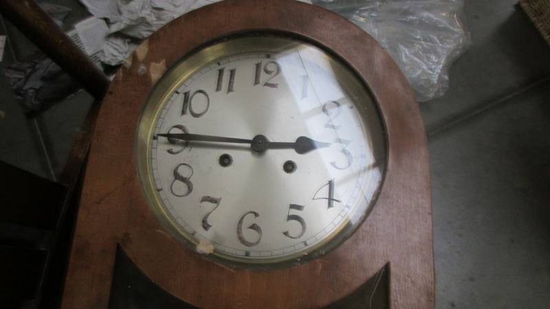 An old 8 day wall clock. - Image 2 of 2