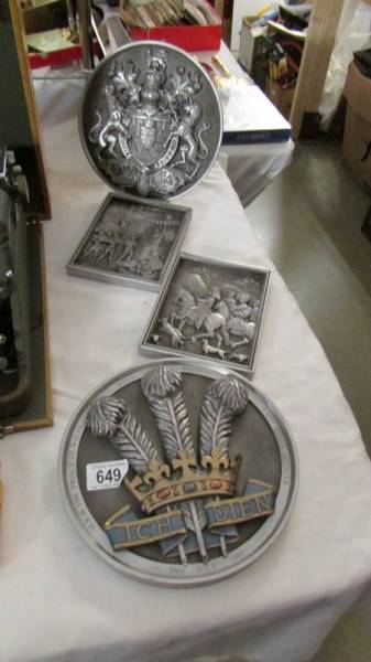 Two metal wall plaques celebrating 'The Royal Wedding' 29th July 1981 and two other metal plaques.