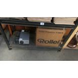 A boxed Rollei projector.