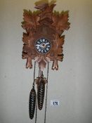 A carved black forest cuckoo clock