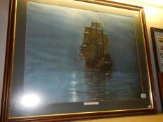 A large framed print of a galleon titled 'The crescent moon',
