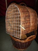 A vintage wicker cat travel basket and 2 other wicker baskets