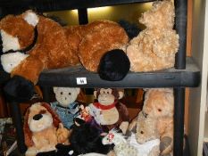 A quantity of soft stuffed toys on 2 shelves including large Pony/Horse