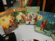 Four 1970's Rupert books.