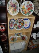 A good selection of collectors plates including German plates by Ursula Band and Chelsea flower