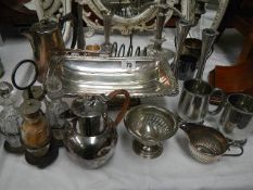 A selection of silver plate including cruet set,