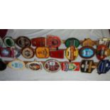 A good lot of breweriana pub beer clips on 3 wooden poles Collect only