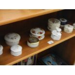 A quantity of porcelain trinket boxes