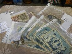 A selection of vintage foreign banknotes and coins