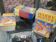 Three Harry Potter books The order of the Phoenix,