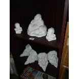 4 classical plaster shelf brackets plus a Buddah and 2 skulls Collect only