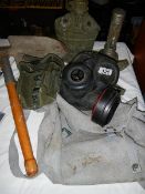 A quantity of militaria including water bottle, kit bag,