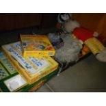 A quantity of soft toys including vintage Rupert,