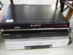 A Panasonic VHS player and a Toshiba and Samsung dvd players,