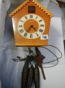 A Russian cuckoo clock with extra weight