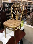 A gold painted bentwood chair