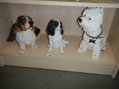 3 lifelike resin ornaments of dogs