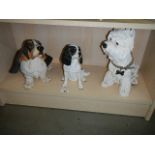 3 lifelike resin ornaments of dogs