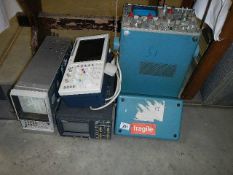 An oscilloscope 454A a type of electronic test instrument plus other items