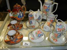 A hand painted 15 piece tea set plus a Chinese teapot and 2 cups and saucers