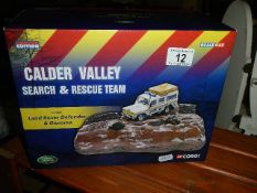 A boxed Corgi CV1002 Ltd Ed Calder Valley search and rescue team Land Rover Defender and Diorama