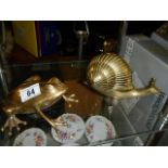 A large brass frog and snail ornament