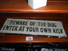 A cast iron beware of the dog sign