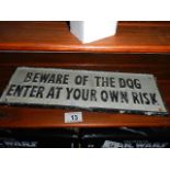 A cast iron beware of the dog sign