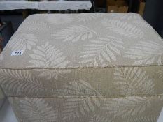 A fabric covered bedroom stool storage box,