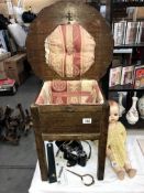 A 1930's oak sewing work table