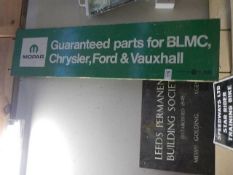 A Leeds building society sign, BLMC car parts advertising sign etc,