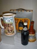 A Bell's whisky bell (no contents), a gift pack, pub jug etc.
