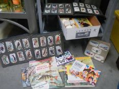 A quantity of Brooke Bond tea card albums and albums of part sets of cigarette cards