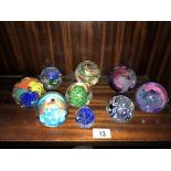 9 glass paperweights including Caithness