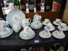 A Royal Worcester set 6 coffee cups and saucers and a Royal Albert 'Elfin' tea set