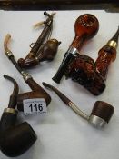 A quantity of vintage smokers pipes etc