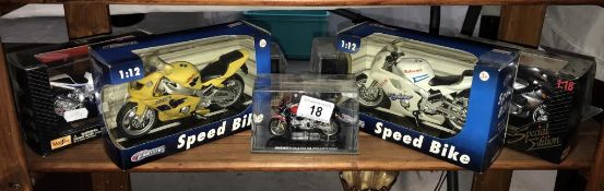 A quantity of boxed diecast motorcycles by Maisto etc