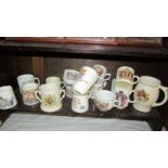 A mixed lot of commemorative mugs and cups. (Collect only).