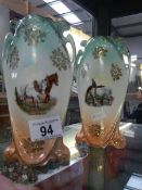 A pair of vintage Austrian porcelain vases with working horses images