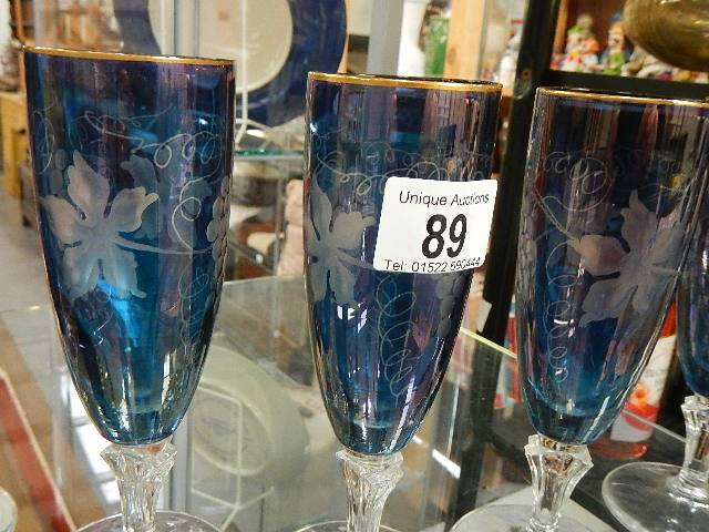 A set of 6 blue cut glass flutes/glasses - Image 2 of 3