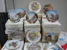 Approximately 54 boxed collector's plates including Song Birds, Wings Upon the Wind,