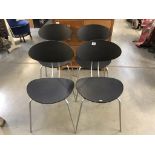 Four retro style chairs.